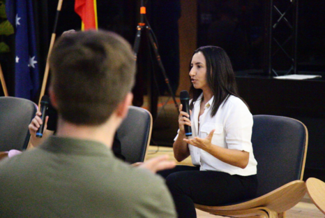 Renee Francis presenting on stage